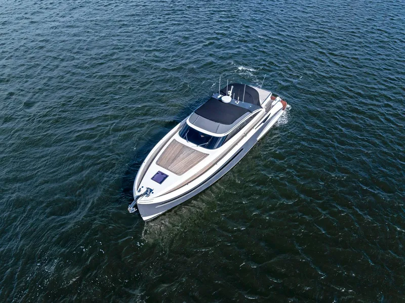Slide: The Image of Aerial view of 2021 Sichterman Libertas 54 yacht cruising on open water. - 47