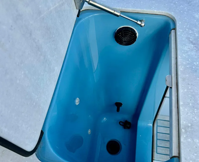 Slide: The Image of Blue sink basin on 2021 Regal 38 SAV boat. - 26