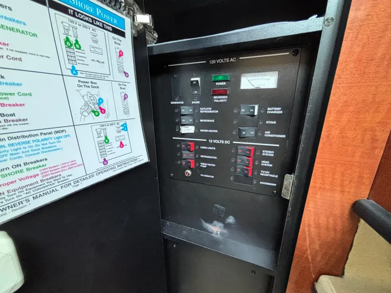 Slide: The Image of Electrical panel of 2005 Sea Ray 260 Sundancer boat. - 37