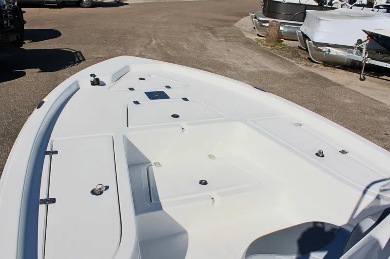 Slide: The Image of 2025 NauticStar 214 Shallow Bay boat deck, spacious and sleek design. - 19
