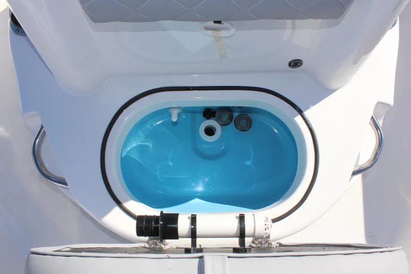 Slide: The Image of Livewell on 2025 NauticStar 214 Shallow Bay boat, featuring a sleek design. - 27