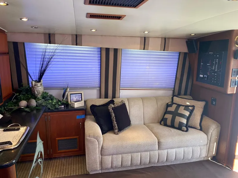 Slide: The Image of Interior of 1992 Henriques 50 Sportfisherman with cozy sofa and decorative pillows. - 14