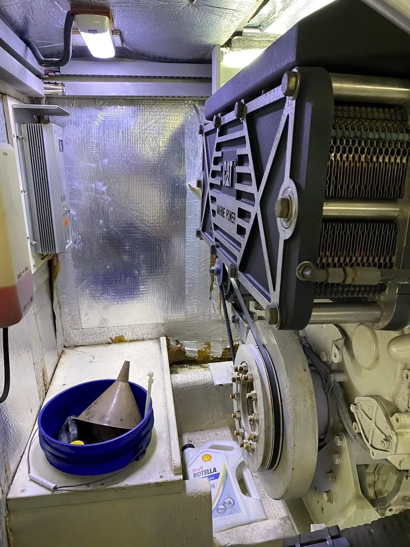Slide: The Image of Engine room of 1992 Henriques 50 Sportfisherman with equipment and tools. - 27