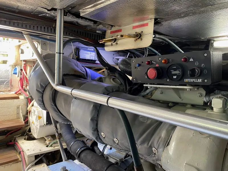 Slide: The Image of Engine room of 1992 Henriques 50 Sportfisherman with Caterpillar controls. - 29