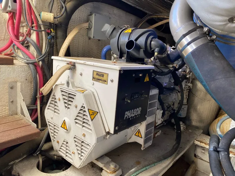 Slide: The Image of Engine room of 1992 Henriques 50 Sportfisherman with generator and wiring. - 32