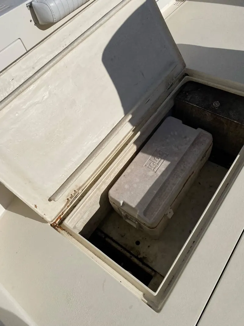 Slide: The Image of Open storage compartment on 1992 Henriques 50 Sportfisherman boat. - 5