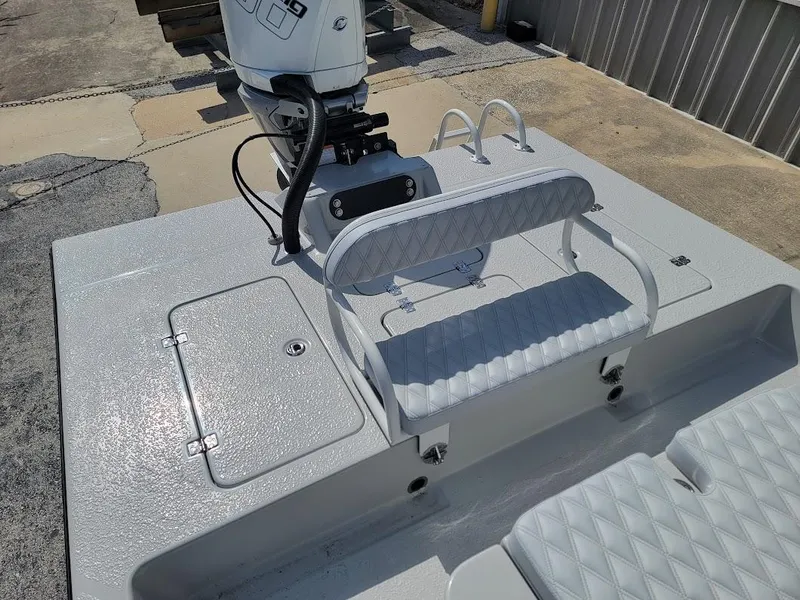 Slide: The Image of 2025 SCB R24 boat deck with seating and motor, featuring a sleek, modern design. - 15