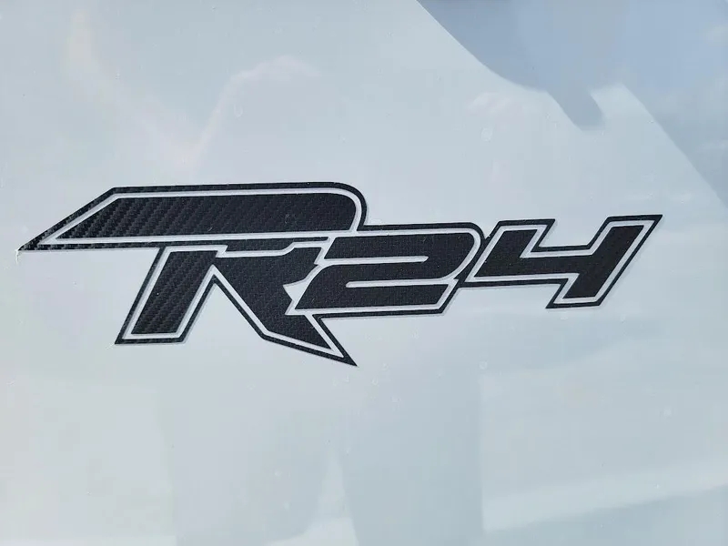 Slide: The Image of SCB R24 2025 model logo on white background. - 17