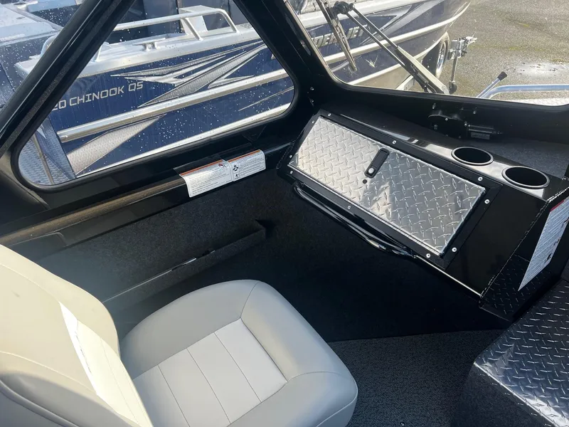 Slide: The Image of 2025 Thunder Jet 185 Luxor interior with seating and storage compartment. - 11