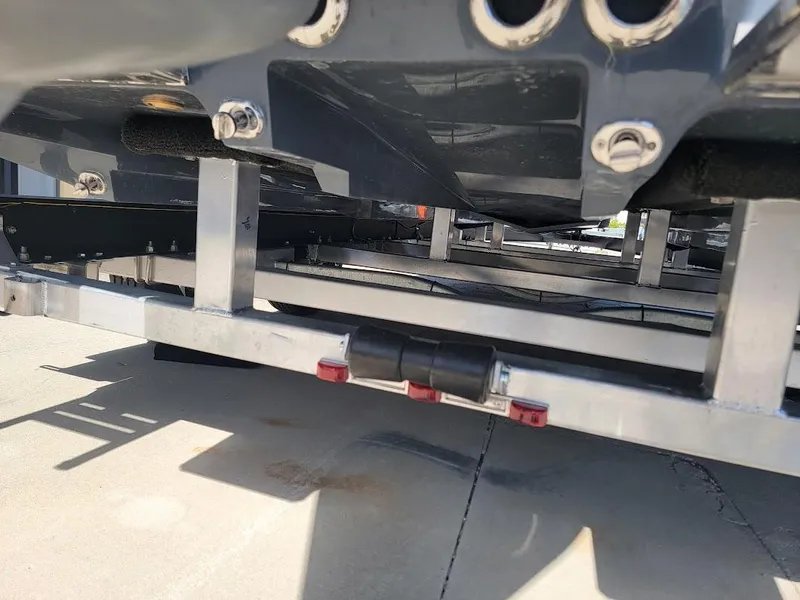 Slide: The Image of Close-up of SCB S22 boat trailer frame, 2025 model, showing metal structure and bolts. - 13
