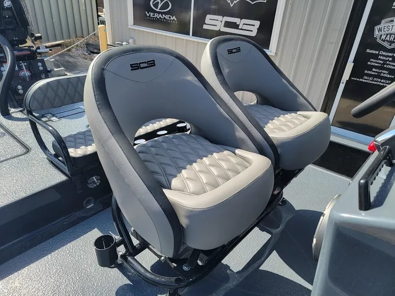 Slide: The Image of 2025 SCB S22 boat seats with quilted design and cup holders. - 20