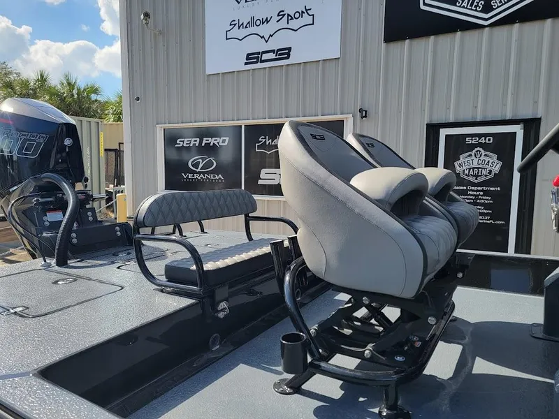 Slide: The Image of 2025 SCB S22 boat with comfortable seating and powerful engine, displayed outdoors. - 9