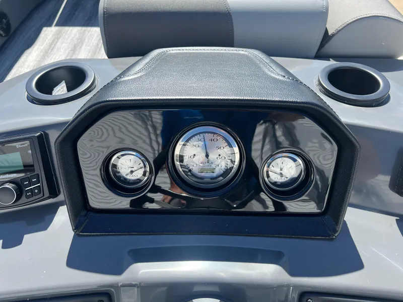 Slide: The Image of Dashboard of 2025 Bennington 20 SL boat with gauges and controls. - 15