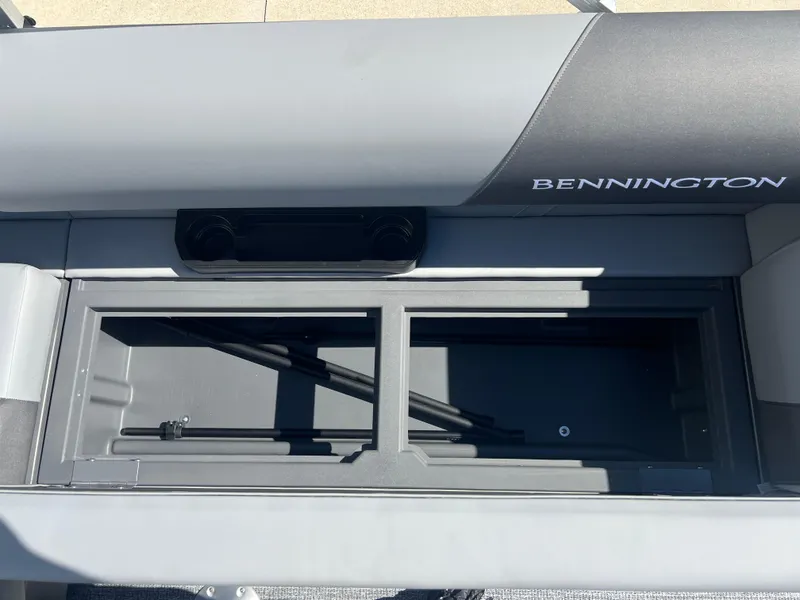 Slide: The Image of 2025 Bennington 20 SL boat storage compartment, open and empty. - 20