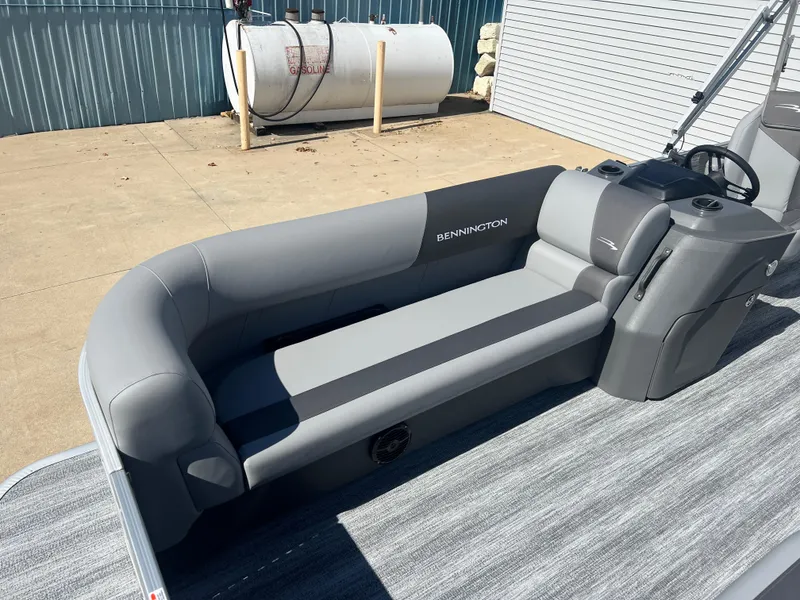 Slide: The Image of 2025 Bennington 20 SL pontoon boat with sleek gray seating and modern design. - 8