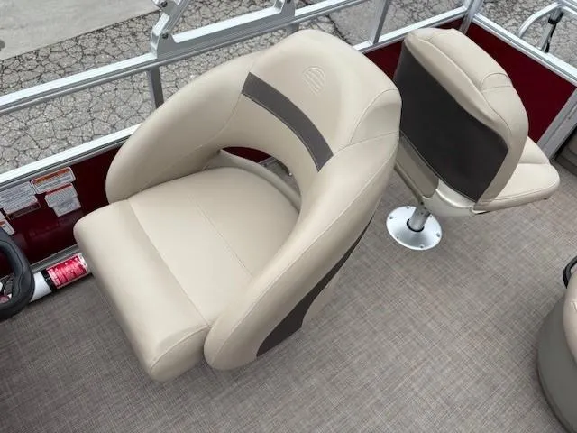 Slide: The Image of 2022 Sun Tracker Bass Buggy 18 DLX boat seats, beige upholstery, modern design. - 20