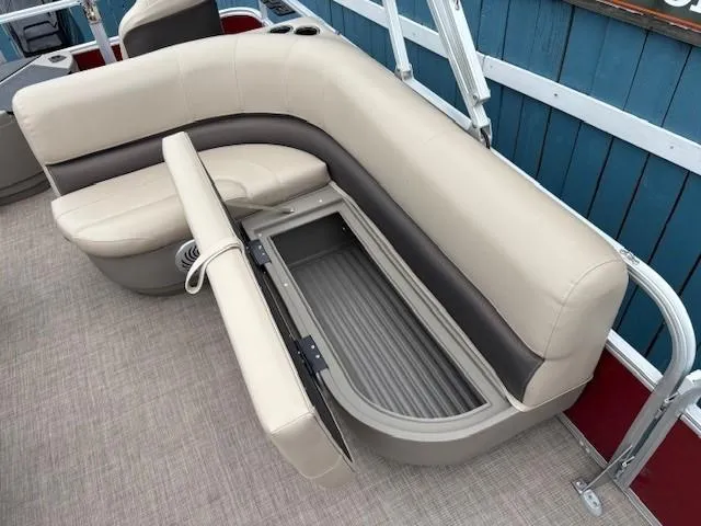 Slide: The Image of 2022 Sun Tracker Bass Buggy 18 DLX pontoon boat with open storage compartment. - 22