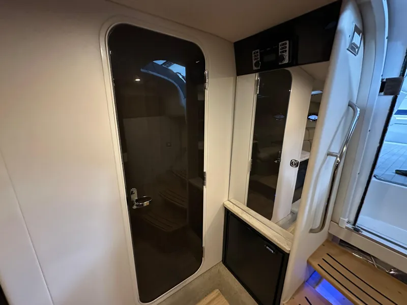 Slide: The Image of Interior of 2014 Formula 370 Super Sport yacht, featuring sleek cabin design and modern amenities. - 20