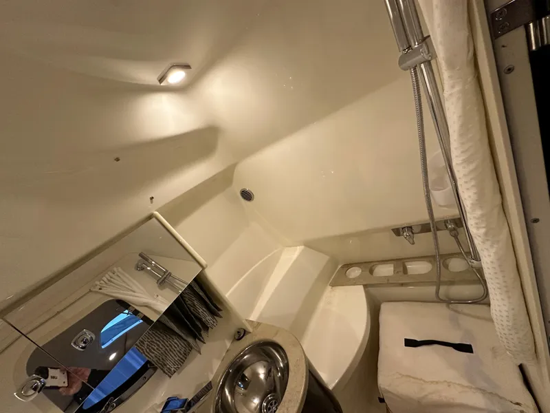 Slide: The Image of 2014 Formula 370 Super Sport bathroom interior with sink and shower. - 23