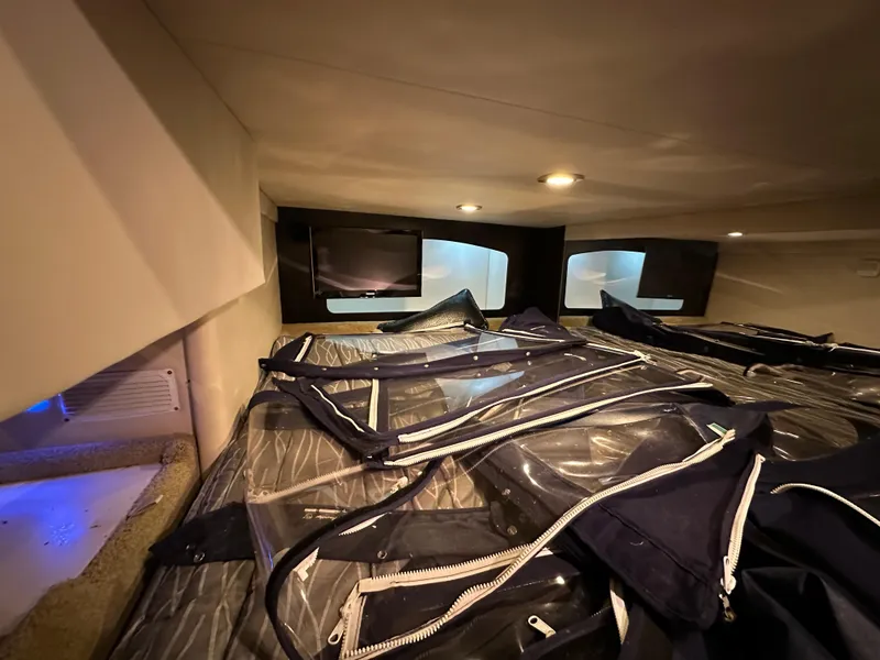 Slide: The Image of Interior cabin of 2014 Formula 370 Super Sport with storage bags and ambient lighting. - 25