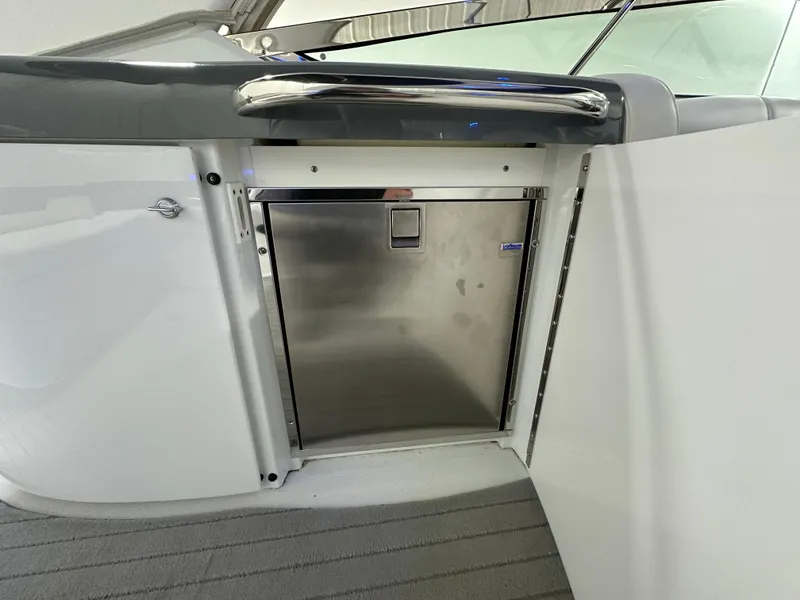 Slide: The Image of 2014 Formula 370 Super Sport boat interior with stainless steel refrigerator. - 7