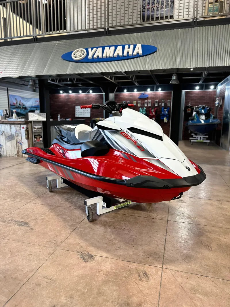 Slide: The Image of 2025 Yamaha WaveRunner GP HO in showroom, red and white design. - 1
