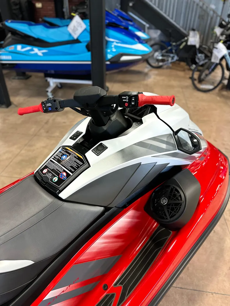 Slide: The Image of 2025 Yamaha WaveRunner GP HO in showroom, featuring sleek red and gray design. - 3