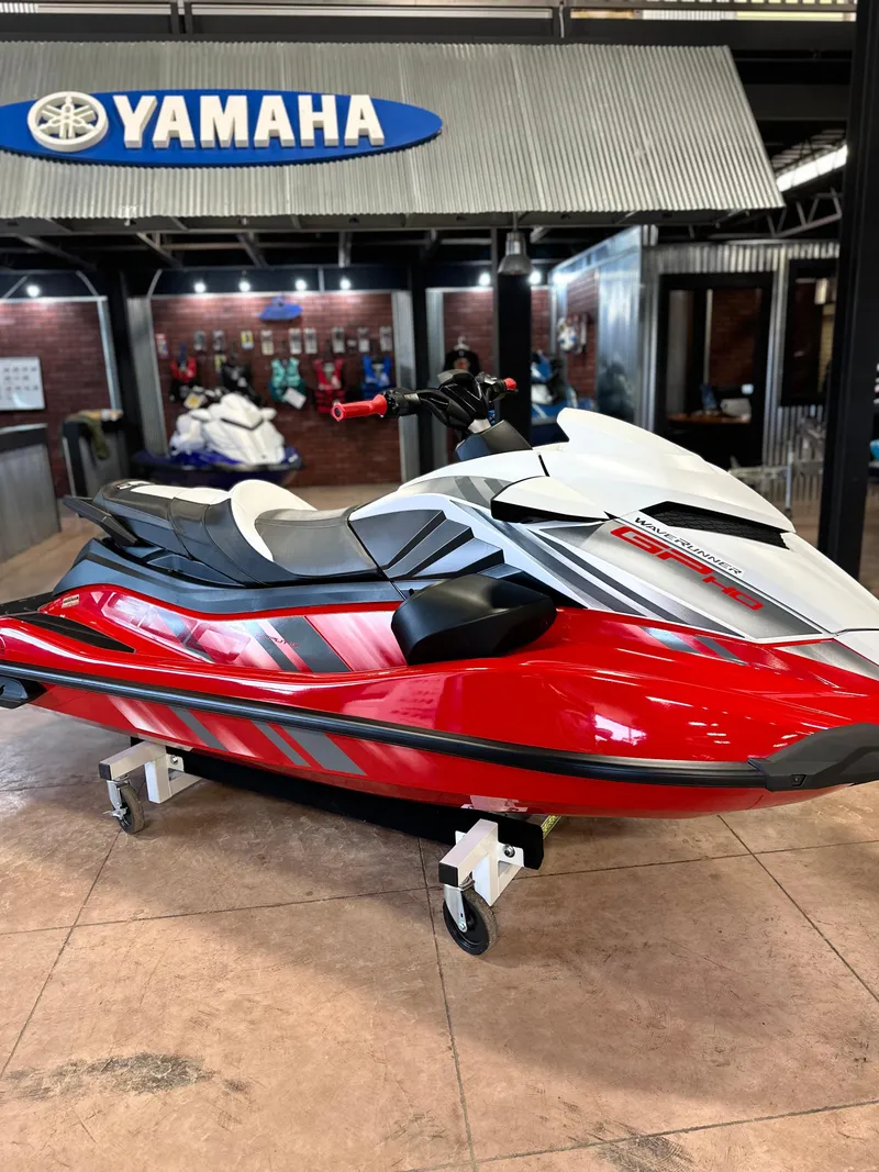 Slide: The Image of 2025 Yamaha WaveRunner GP HO in showroom, red and white design, sleek and modern. - 4