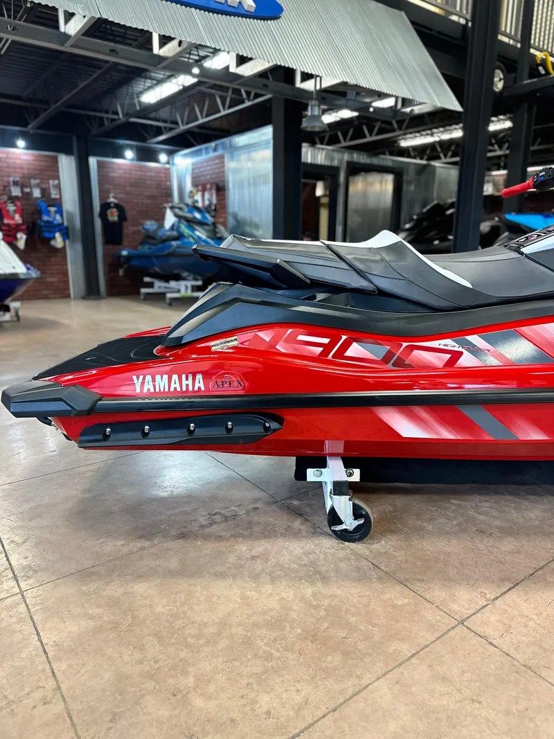 Slide: The Image of 2025 Yamaha WaveRunner GP HO in showroom, red and black design. - 5