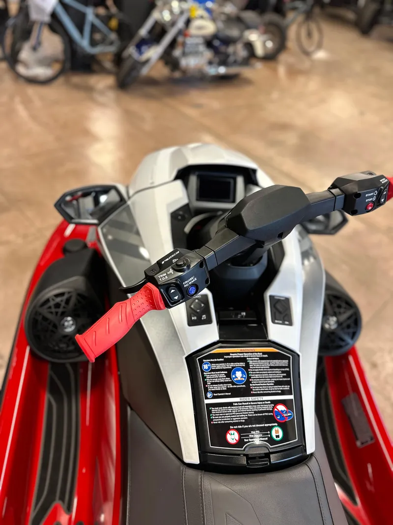 Slide: The Image of 2025 Yamaha WaveRunner GP HO with red handlebars in showroom. - 6