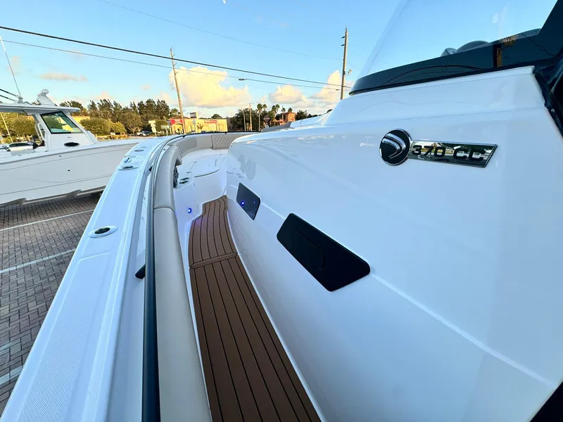 Slide: The Image of 2025 Edgewater 370 CC boat with sleek design and modern features. - 22