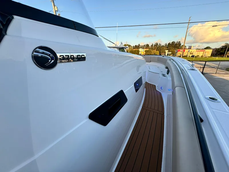 Slide: The Image of 2025 Edgewater 370 CC boat with sleek design and modern features. - 23