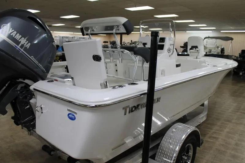Slide: The Image of 2025 Tidewater 1910 BM boat with Yamaha engine on display indoors. - 5