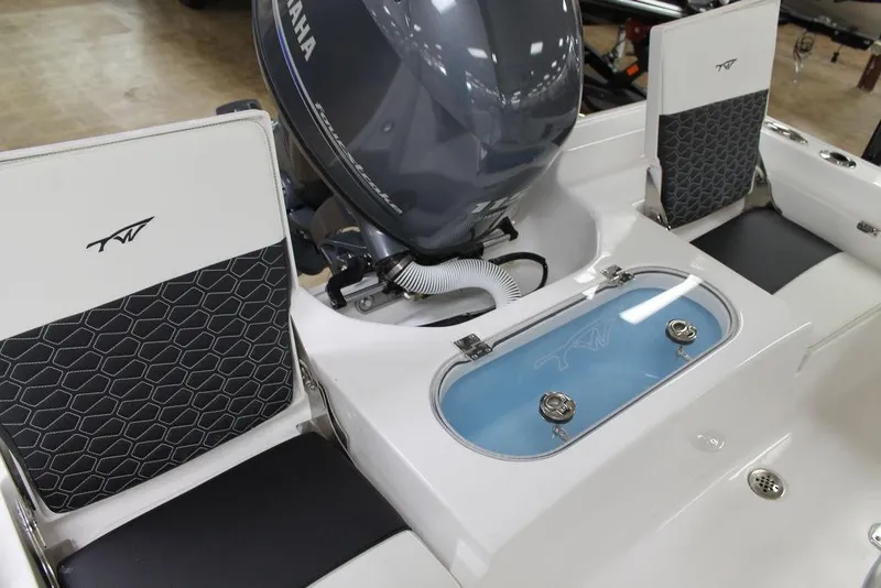 Slide: The Image of 2025 Tidewater 1910 BM boat interior with Yamaha engine and stylish seating. - 8