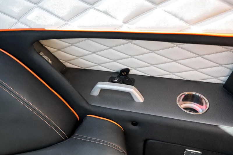 Slide: The Image of Interior of 2020 Fountain 47 Lightning boat with quilted paneling and cup holder. - 15