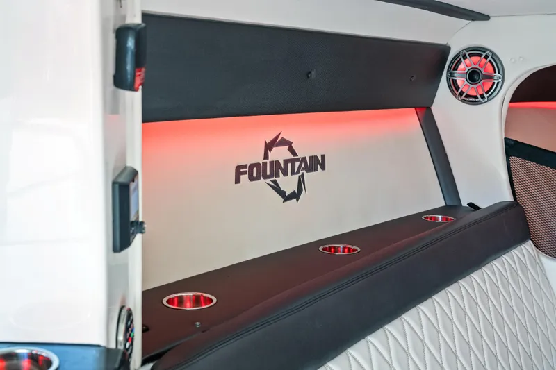 Slide: The Image of Interior of 2020 Fountain 47 Lightning boat with red ambient lighting and logo. - 18