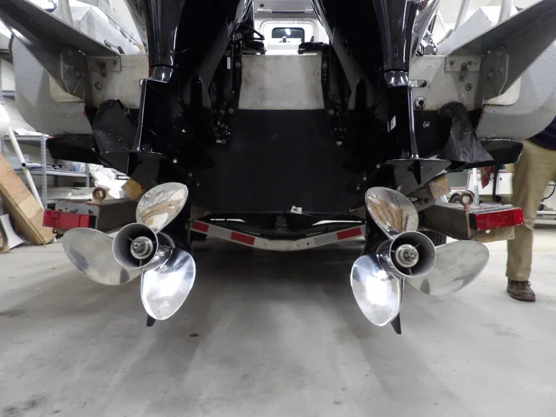 Slide: The Image of 2005 SAFE Boats Defender 25 with dual propellers in a garage setting. - 15