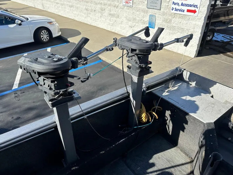 Slide: The Image of 2019 Lund 2000 Sport Angler boat with mounted fishing equipment. - 19