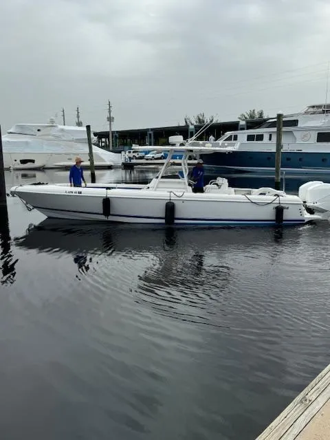Slide: The Image of 2008 Intrepid Open boat docked in a marina with calm waters. - 9