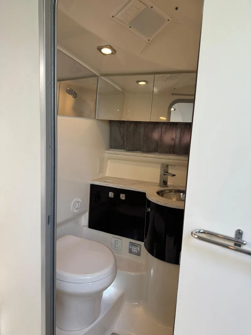 Slide: The Image of 2017 Formula 400 Super Sport yacht bathroom interior with modern fixtures. - 20