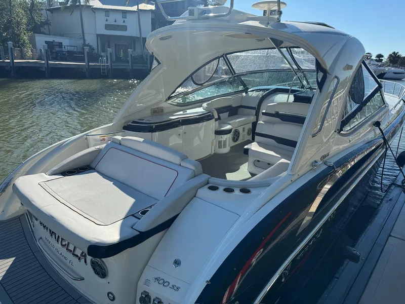Slide: The Image of 2017 Formula 400 Super Sport luxury boat docked by the water. - 28