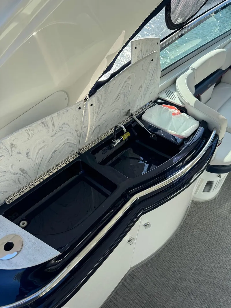 Slide: The Image of 2017 Formula 400 Super Sport yacht interior with open storage compartment. - 29