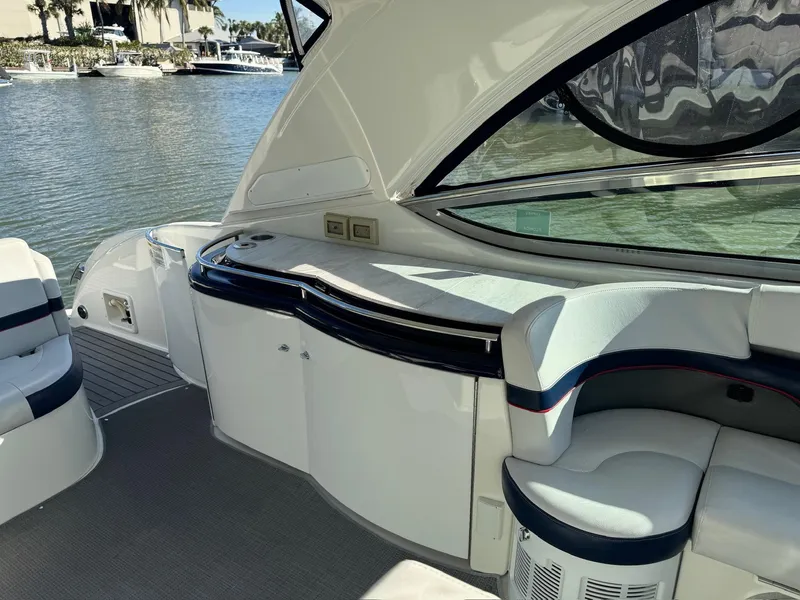 Slide: The Image of 2017 Formula 400 Super Sport yacht interior with seating and waterfront view. - 32