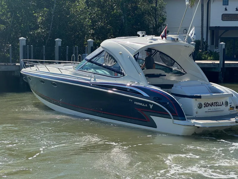 Slide: The Image of 2017 Formula 400 Super Sport boat cruising on a sunny day. - 9