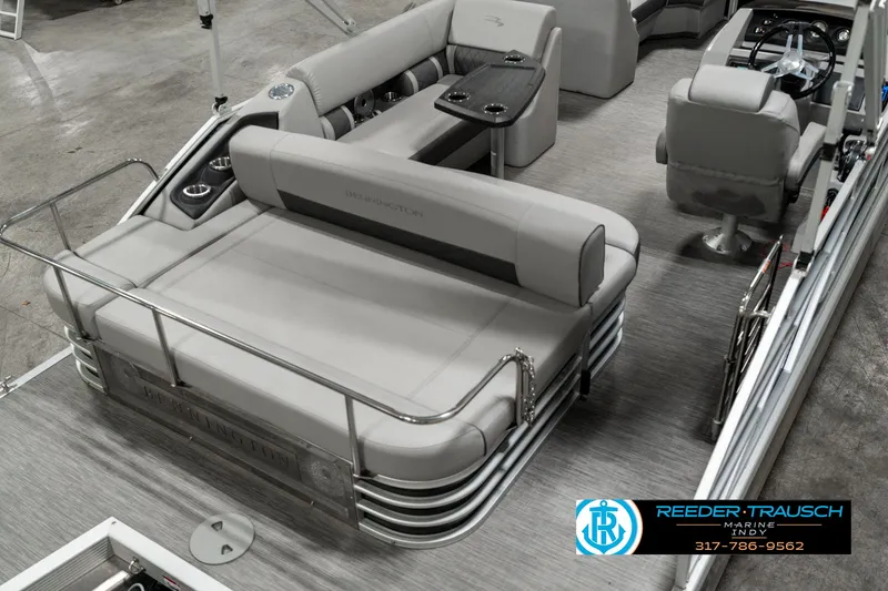 Slide: The Image of 2022 Bennington 22 LSB pontoon boat interior with gray seating and modern design. - 10