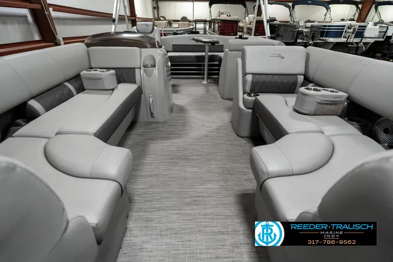 Slide: The Image of 2022 Bennington 22 LSB pontoon boat interior with gray seating and modern design. - 12