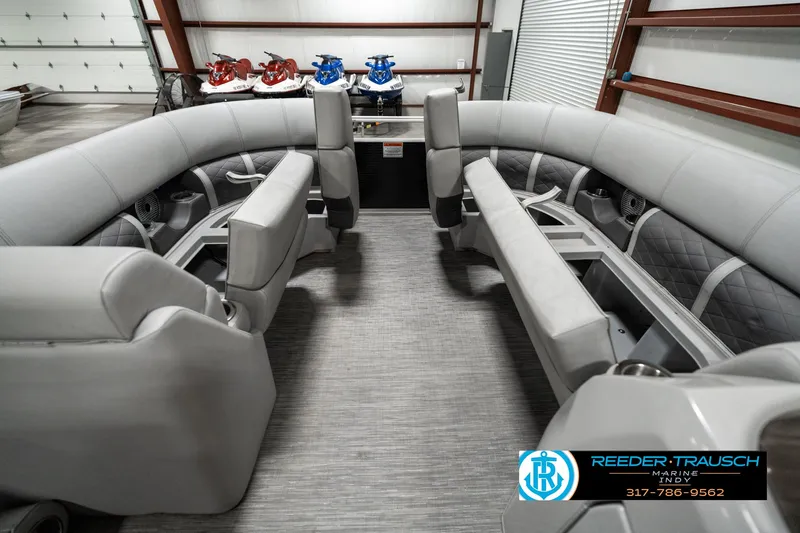 Slide: The Image of 2022 Bennington 22 LSB pontoon boat interior with gray seating and modern design. - 18