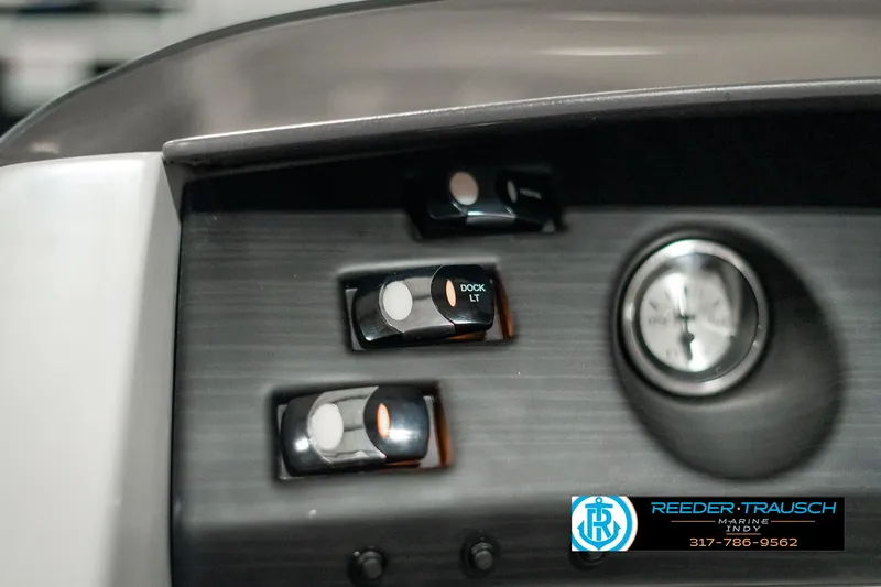 Slide: The Image of Control panel of 2022 Bennington 22 LSB boat with switches and gauge. - 31