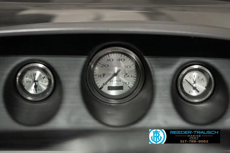 Slide: The Image of Dashboard gauges of 2022 Bennington 22 LSB boat, featuring RPM and fuel indicators. - 32