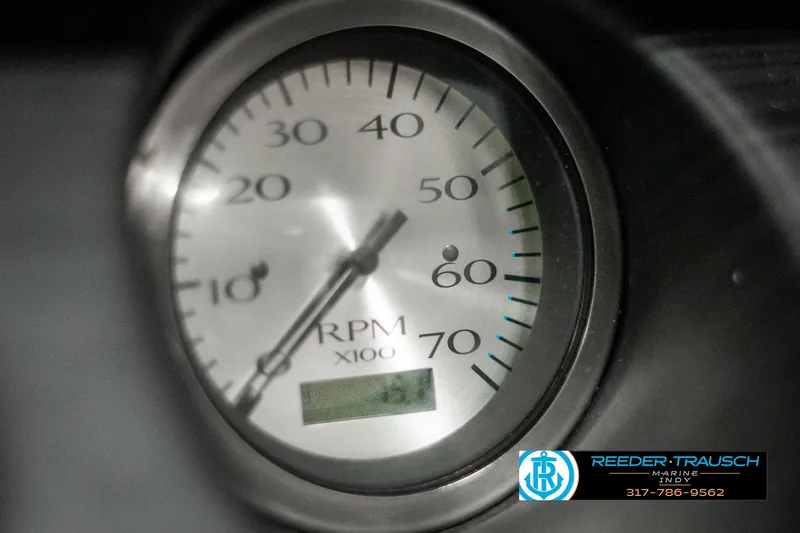 Slide: The Image of Close-up of a 2022 Bennington 22 LSB RPM gauge, showing 60 RPM x100. - 33